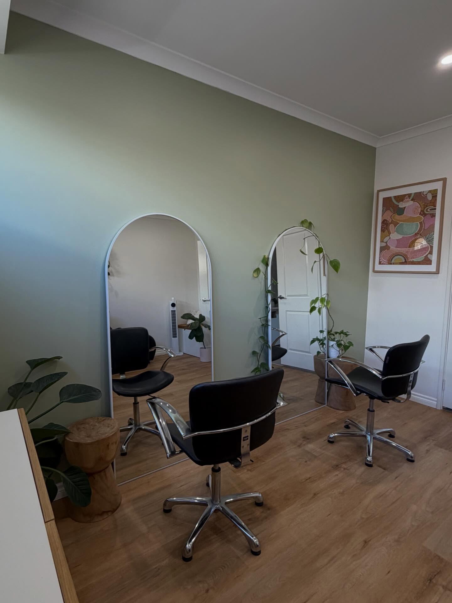 Styling chairs and mirrors inside Holly's House of Hair